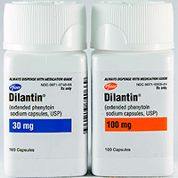 Dilantin tablets in a sealed cup